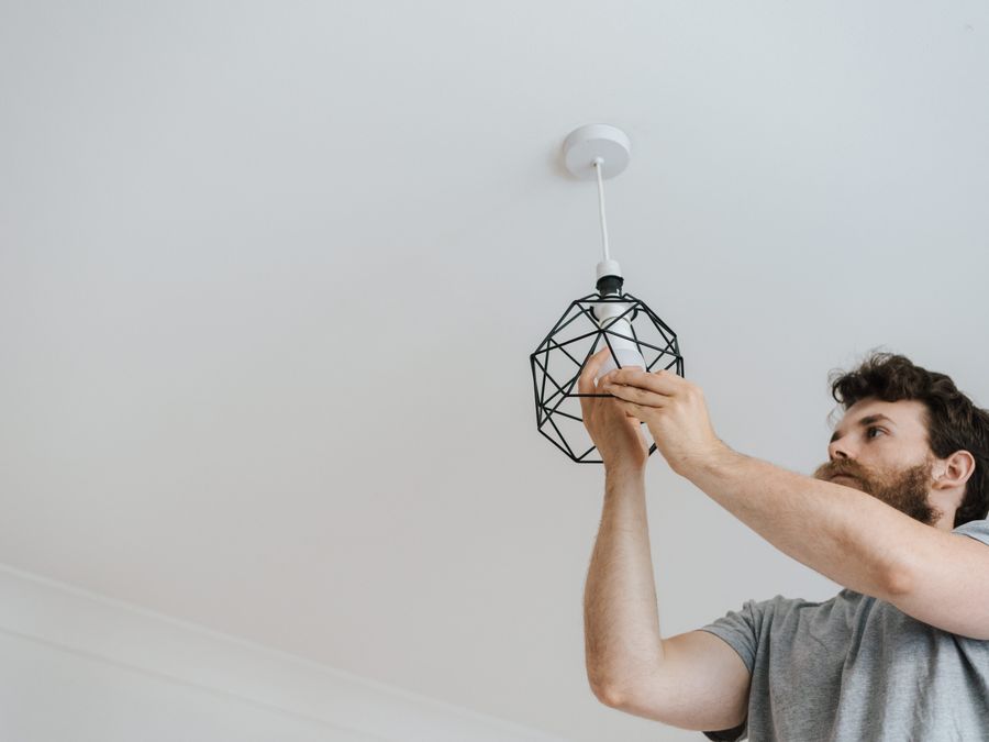 Light fixture being installed by Nawlinz Handyman